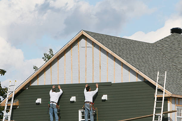 Professional Siding technician working in Sterling, IL